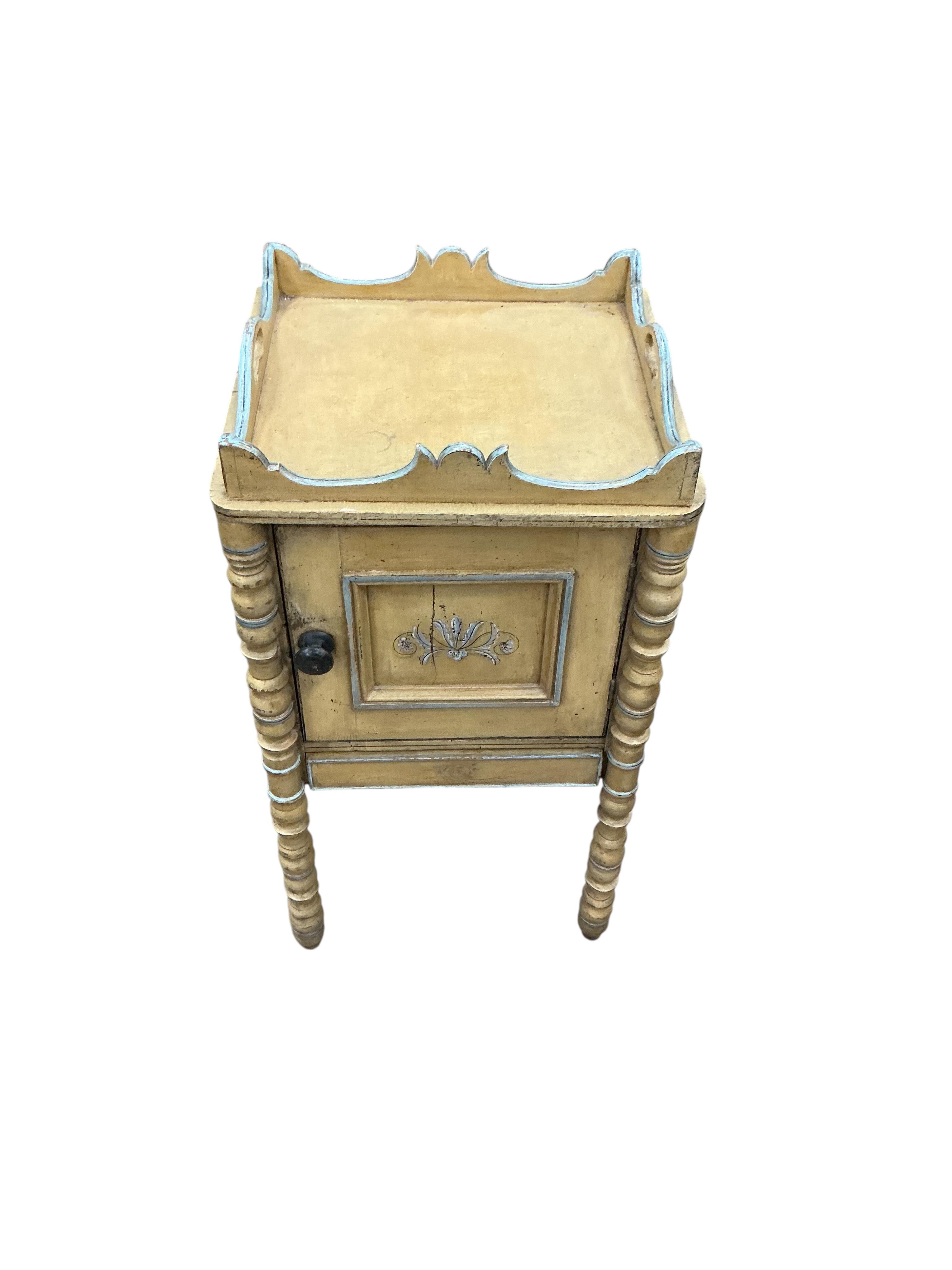 A 19th century painted pine tray top bedside cabinet, width 38cm, depth 35cm, height 71cm